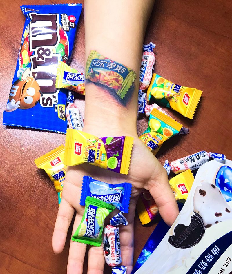 糖果纹身图片_手部手臂欧美写实立体纹身图案