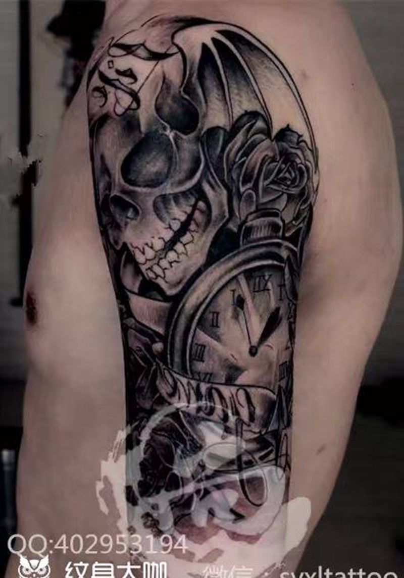 骷髅包大臂纹身图片