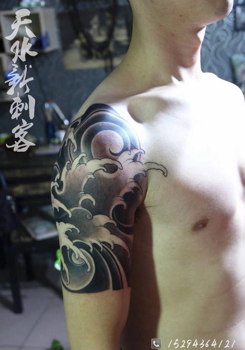 浪花臂纹身图片