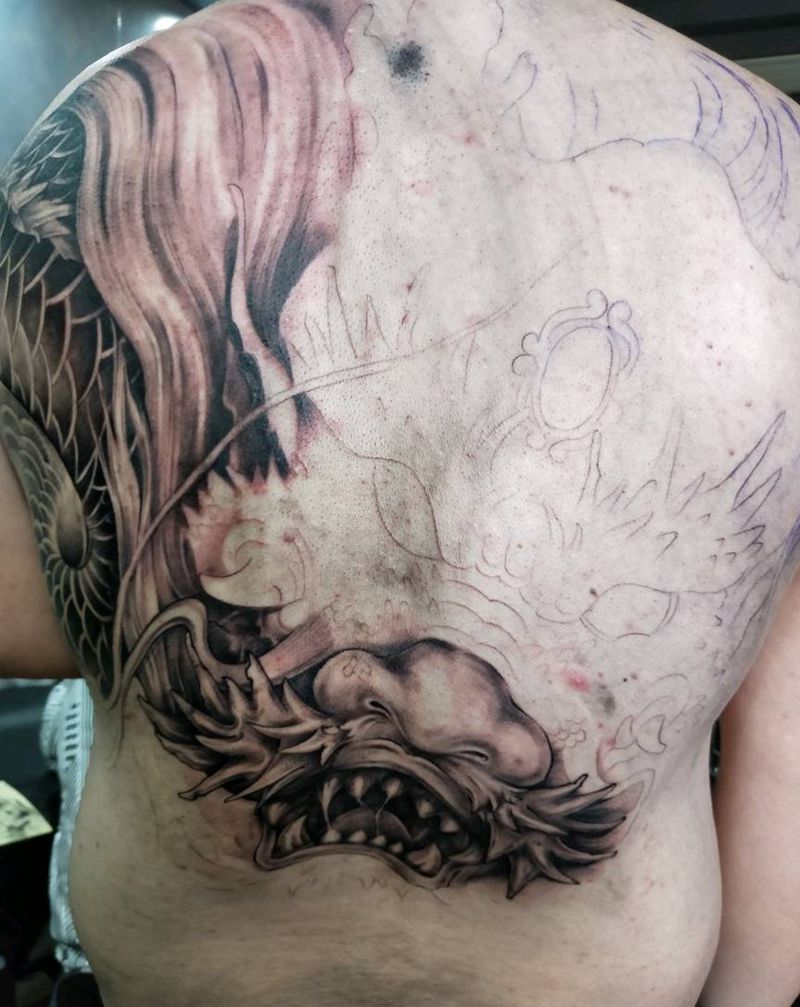 龙游华夏未完纹身图片_背部新传统欧美写实纹身图案