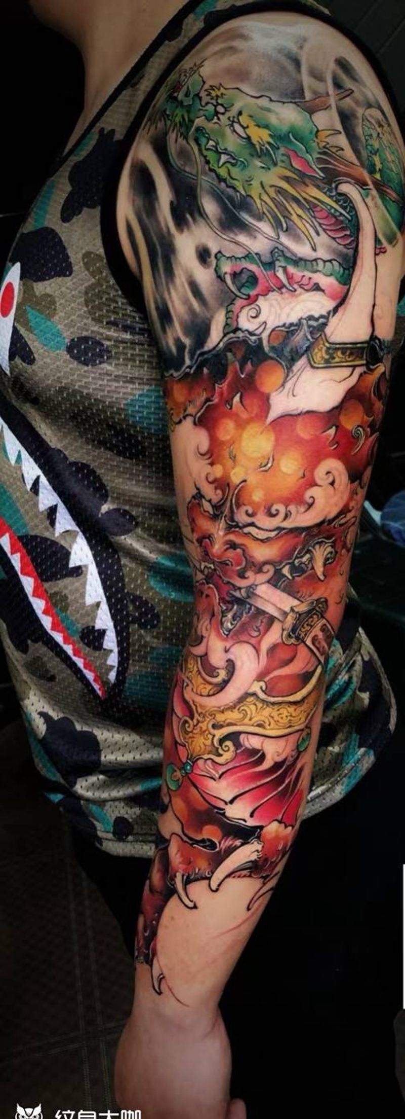 唐狮花臂纹身图片_手臂新传统纹身图案