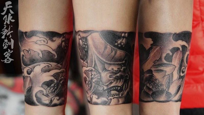 般若臂环纹身图片