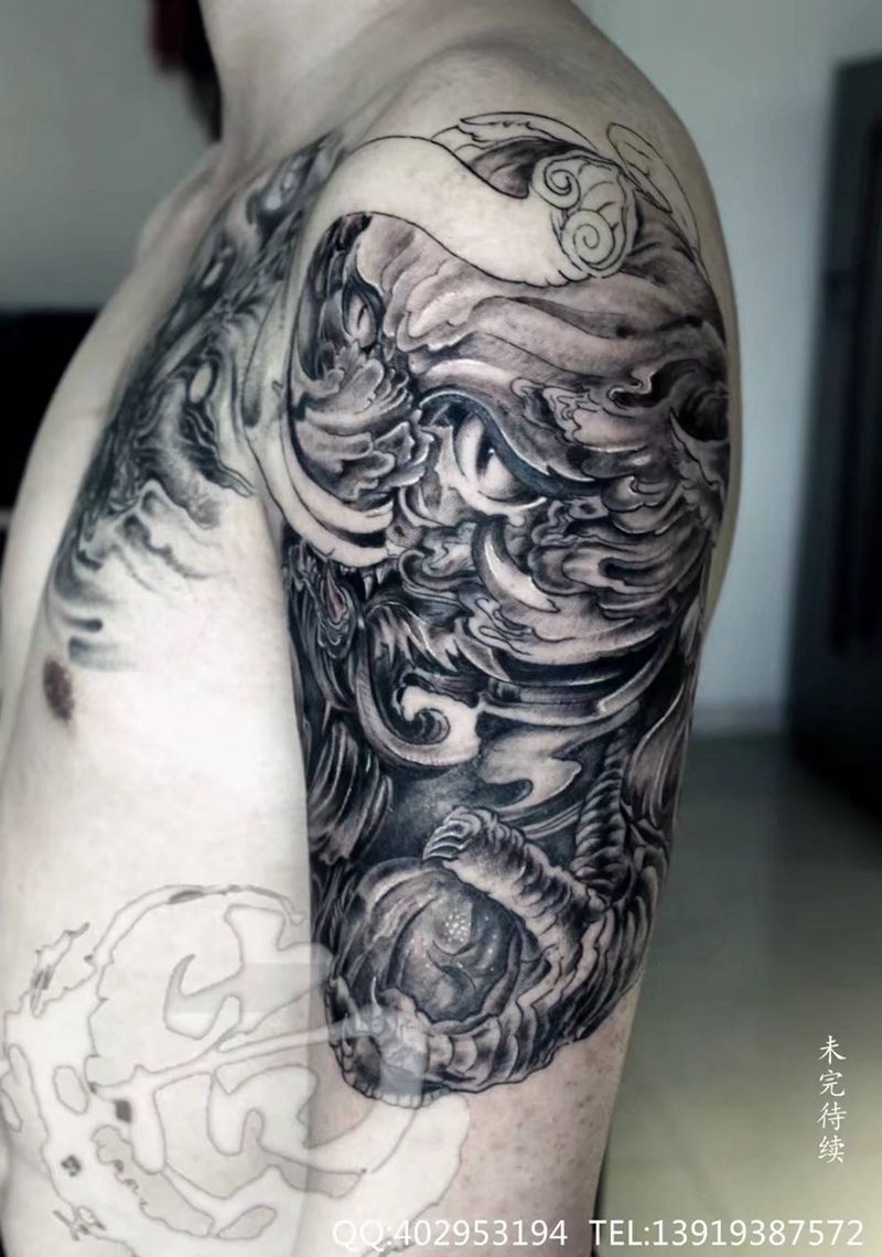 福狮象纹身图片