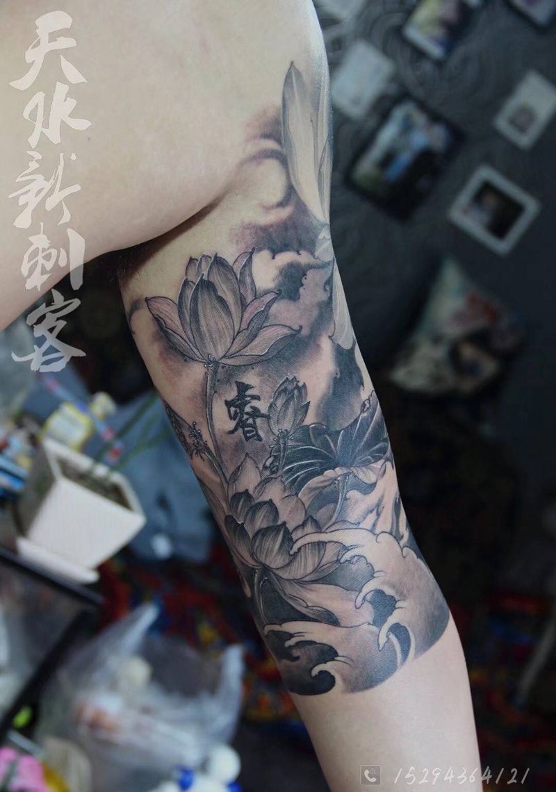 大臂接图纹身图片