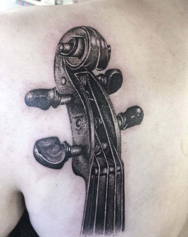 大提琴琴头纹身图片_肩部背部点刺欧美写实大提琴乐器音乐纹身图案