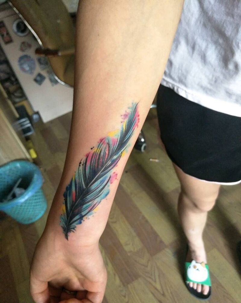 羽毛遮盖小米椒纹身图片