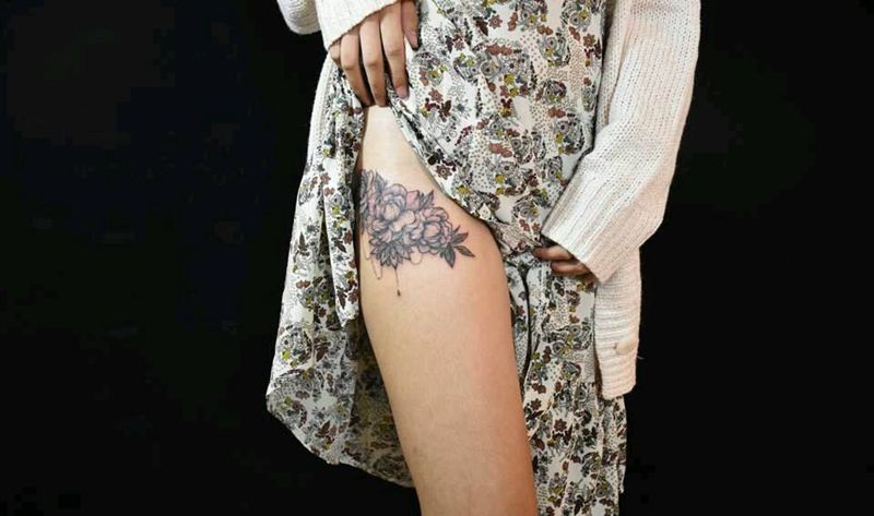 点刺牡丹纹身图片