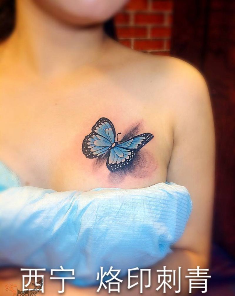 蝴蝶纹身图片_欧美写实动物胸部纹身图案