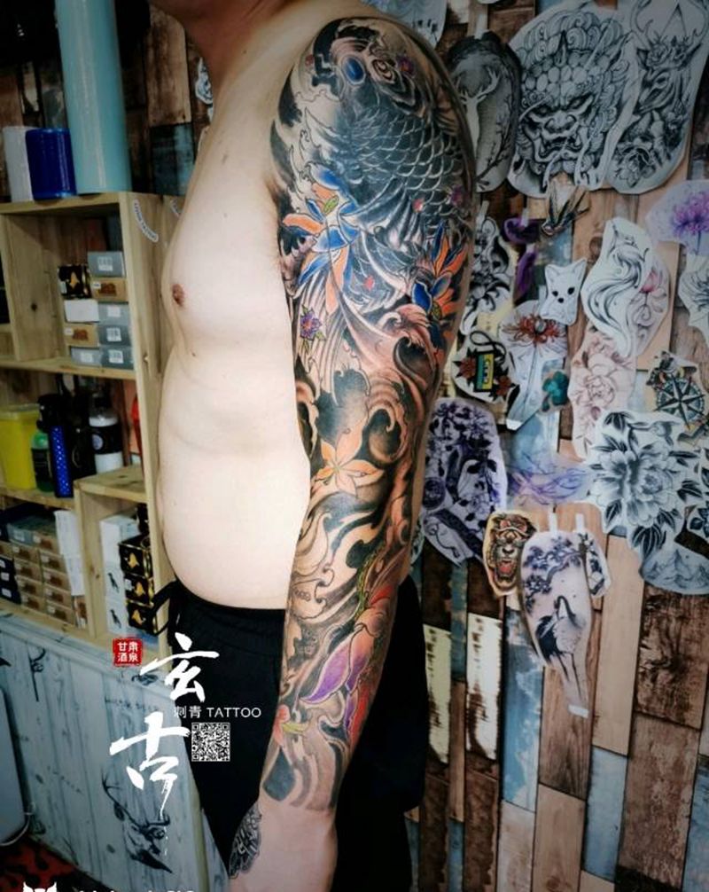 花了个臂纹身图片_手臂新传统纹身图案