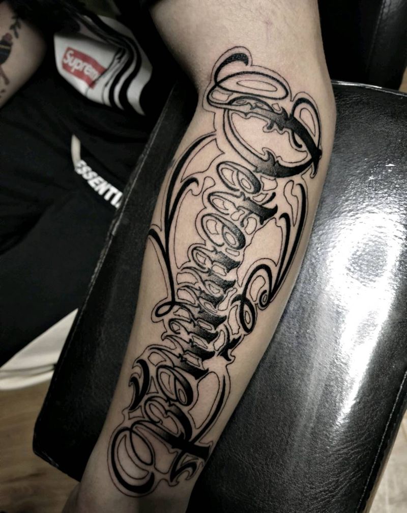 花体(坚决)纹身图片_花体字纹身图案