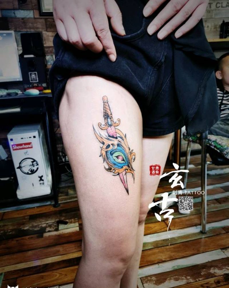 羽灵插刀纹身图片_腿部新传统纹身图案