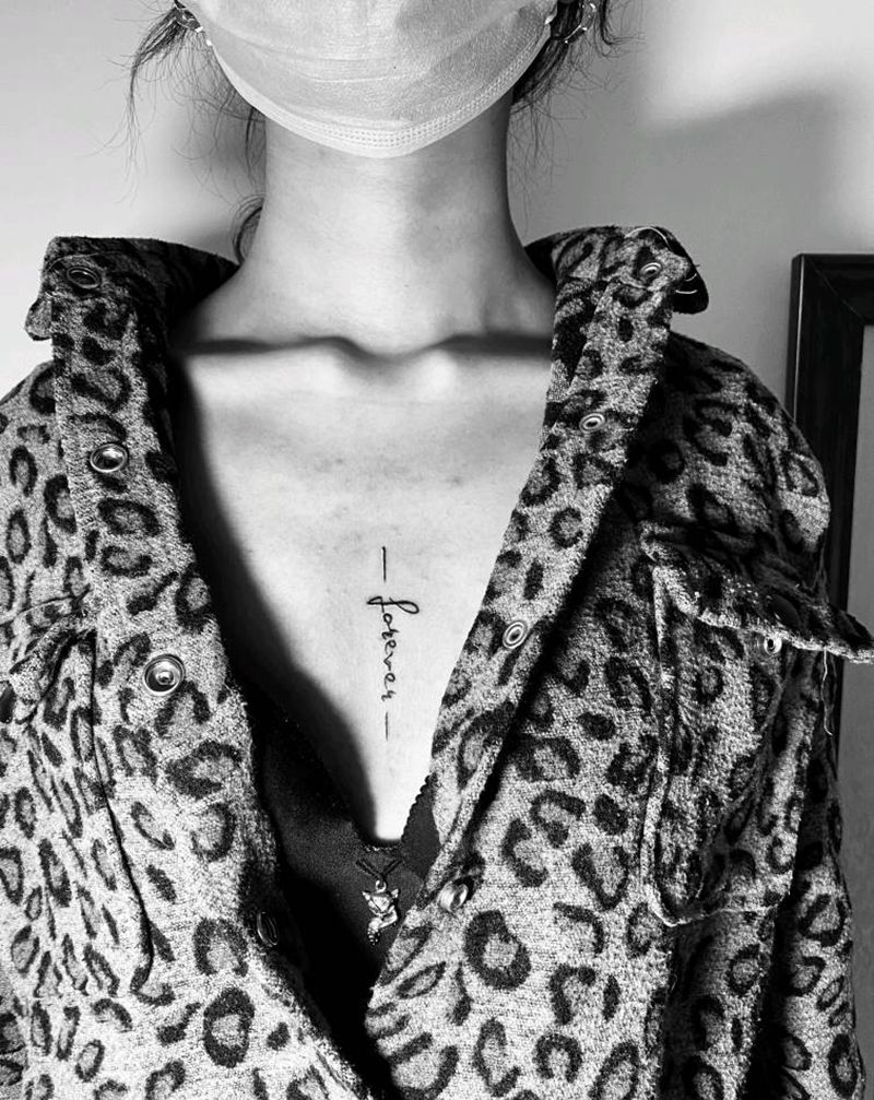 近日纹身图片_胸部纹身图案