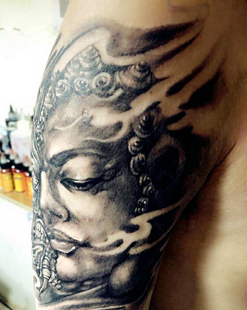 一念之间纹身图片_手臂传统成品纹身图案