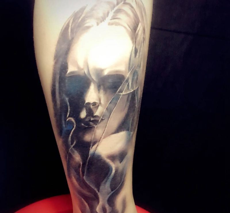 欧美写实纹身图片_成品腿部欧美写实人物宗教纹身图案
