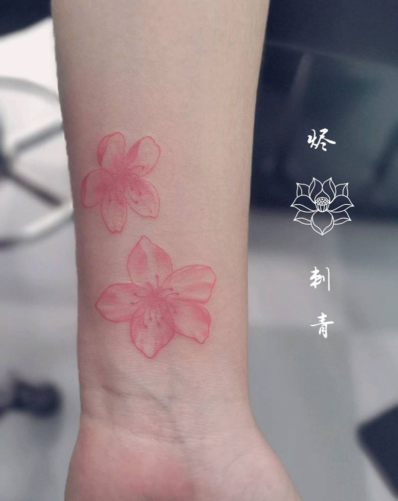樱花纹身图片_手臂几何水彩纹身图案
