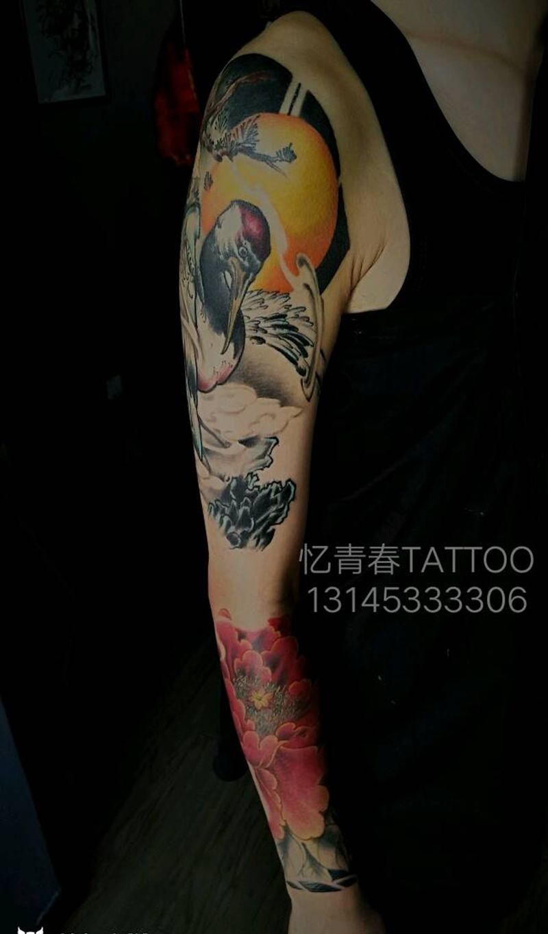 仙鹤牡丹题材纹身图片_手臂传统原创纹身图案