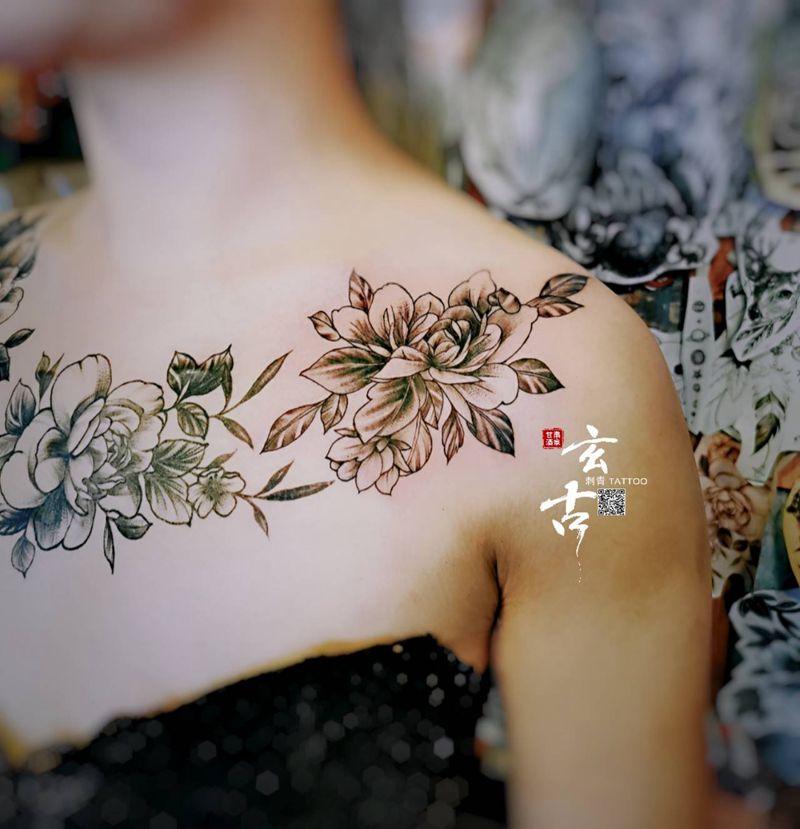 素花左边纹身图片_胸部新传统素花纹身图案