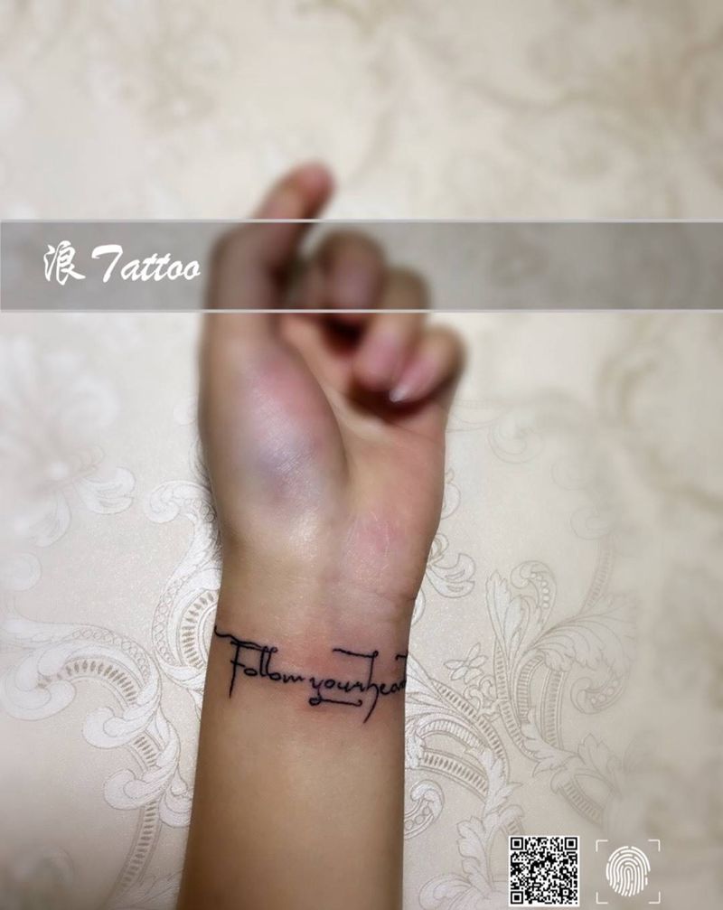 Follow your heart。 达芬奇密码字体纹身图片