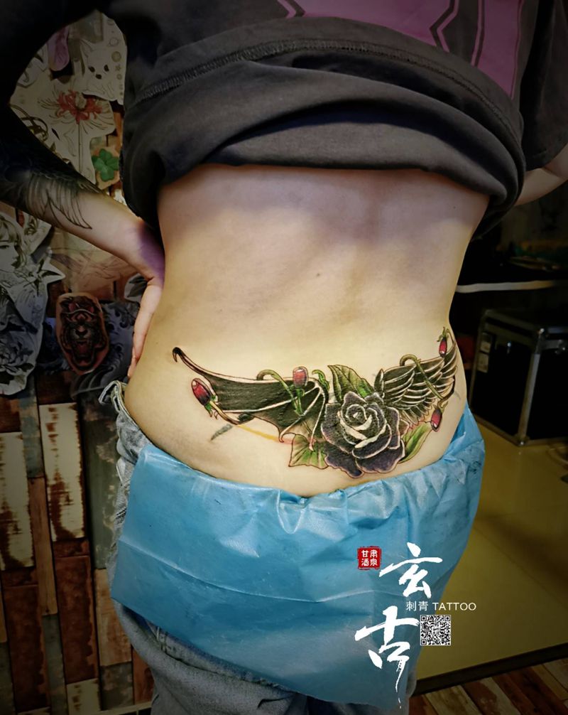 恶魔与天使纹身图片_腰部新传统纹身图案