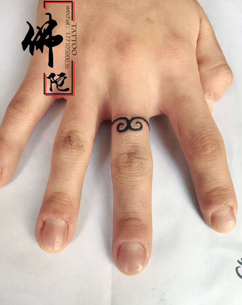 紧箍咒纹身图片_手部Old School纹身图案