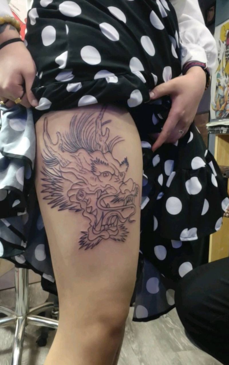 龙头线条纹身图片_腿部纹身图案