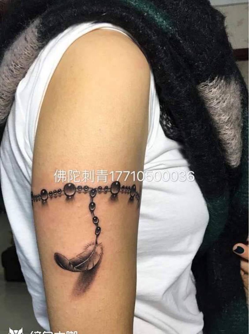 大臂羽毛纹身图片_成品手稿手臂清新几何纹身图案