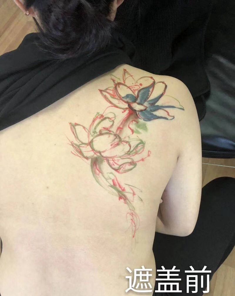 遮盖荷花纹身图片