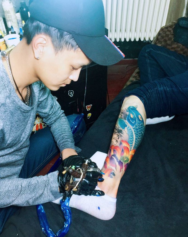 鱼莲花纹身图片