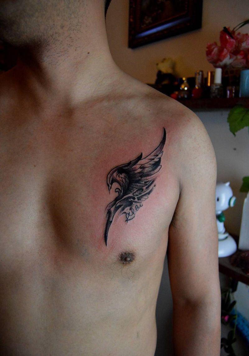 胸口翅膀纹身图片_成品胸部清新传统纹身图案