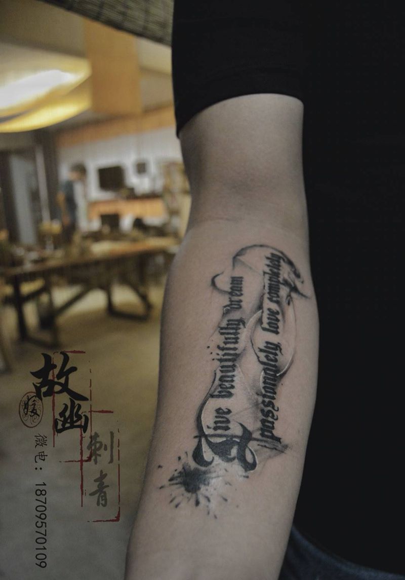 字母完成纹身图片