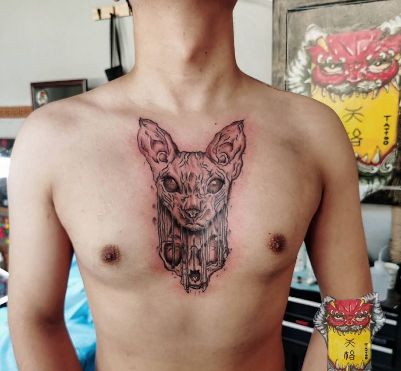 斯芬克斯纹身图片_胸部New School几何猫纹身图案