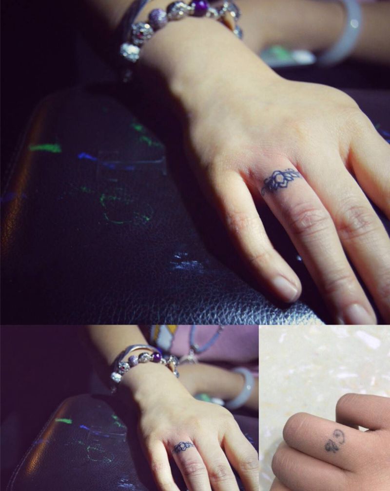 手指字母遮盖纹身图片