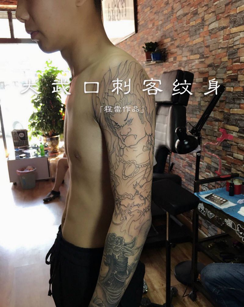 接花臂纹身图片_手臂纹身图案