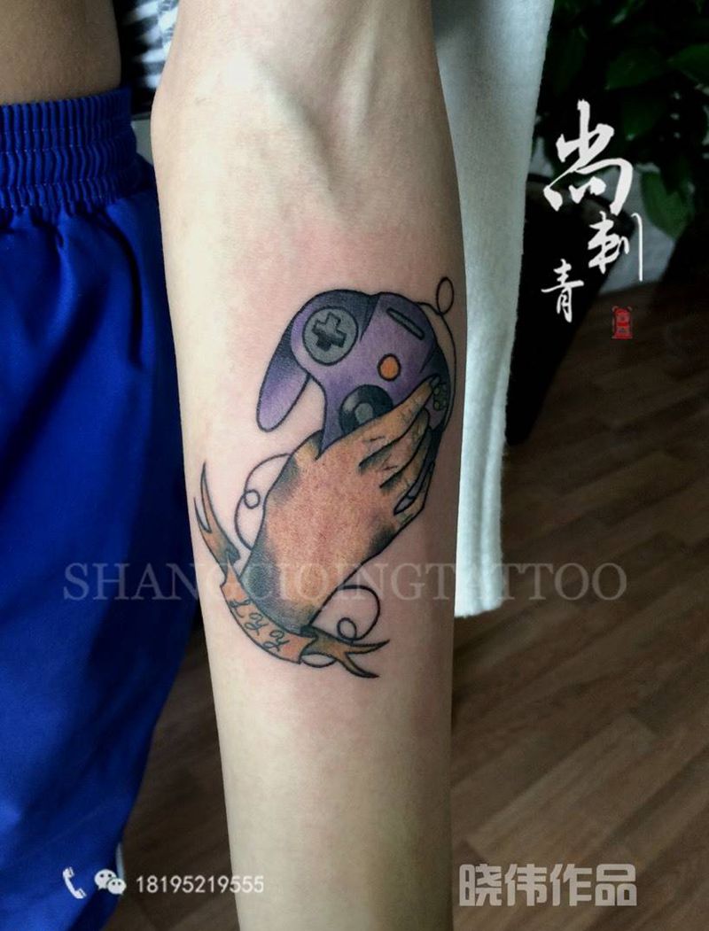 游戏少年纹身图片_成品手臂欧美纹身图案