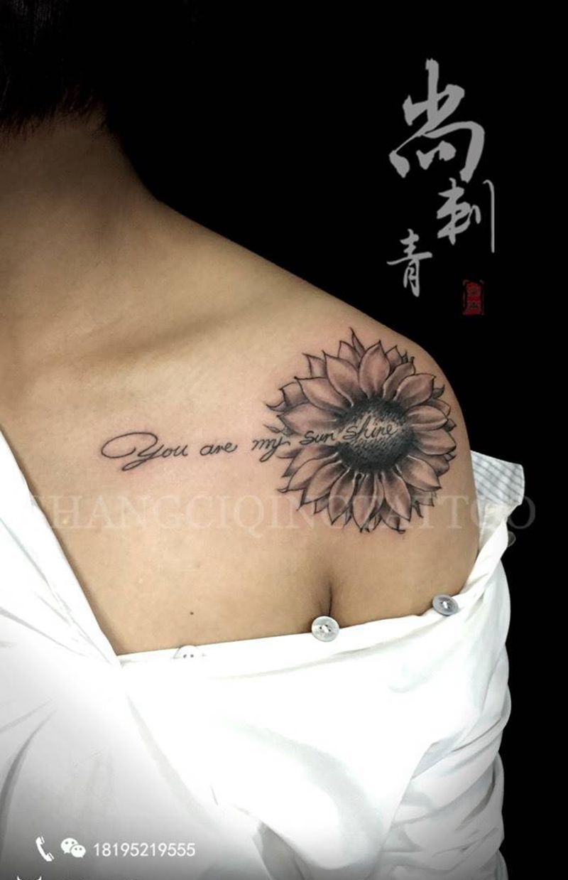 向阳花纹身图片_成品肩部欧美清新植物字符纹身图案