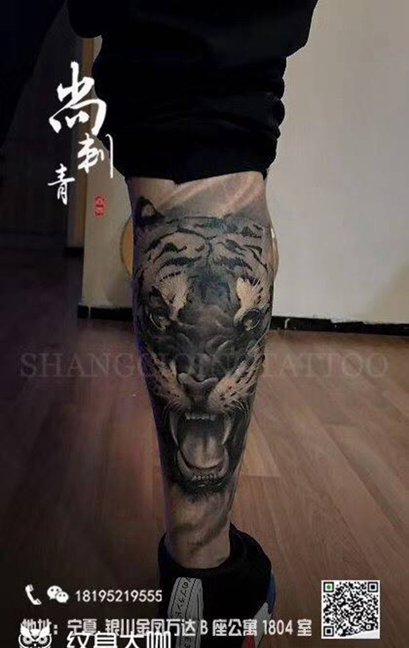 虎纹身图片_成品腿部欧美写实动物纹身图案