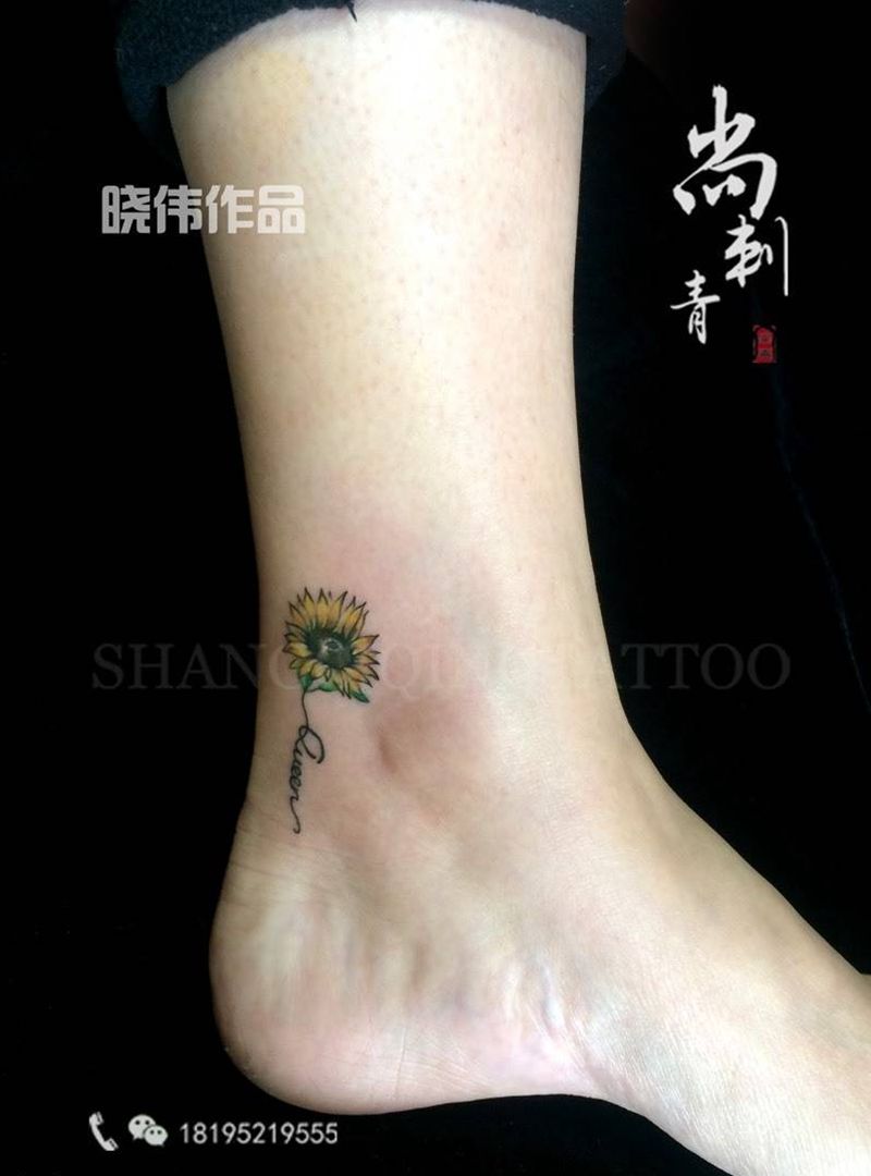 向阳花纹身图片_成品脚部清新植物字符纹身图案