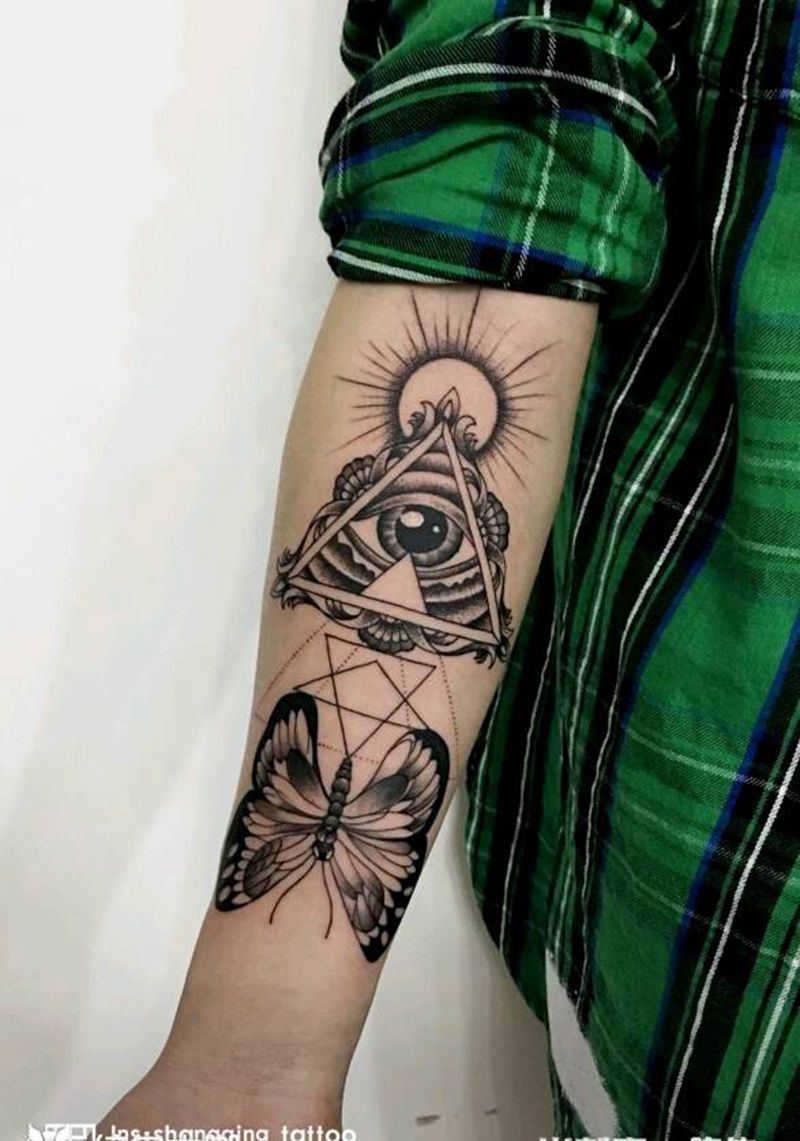 贺鲁斯之眼纹身图片_手臂点刺几何纹身图案