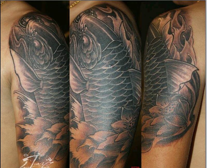 鱼遮盖龙超丑图腾。纹身图片