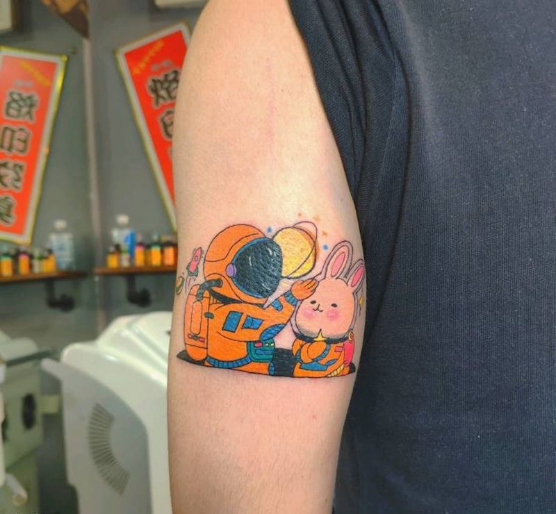 宇航员纹身图片_手臂纹身图案