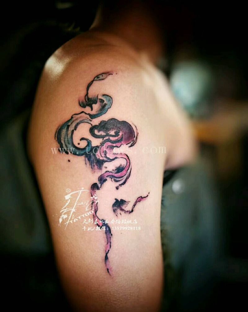 祥云凤凰写意纹身图片_背部臀部手臂动物宗教成品纹身图案