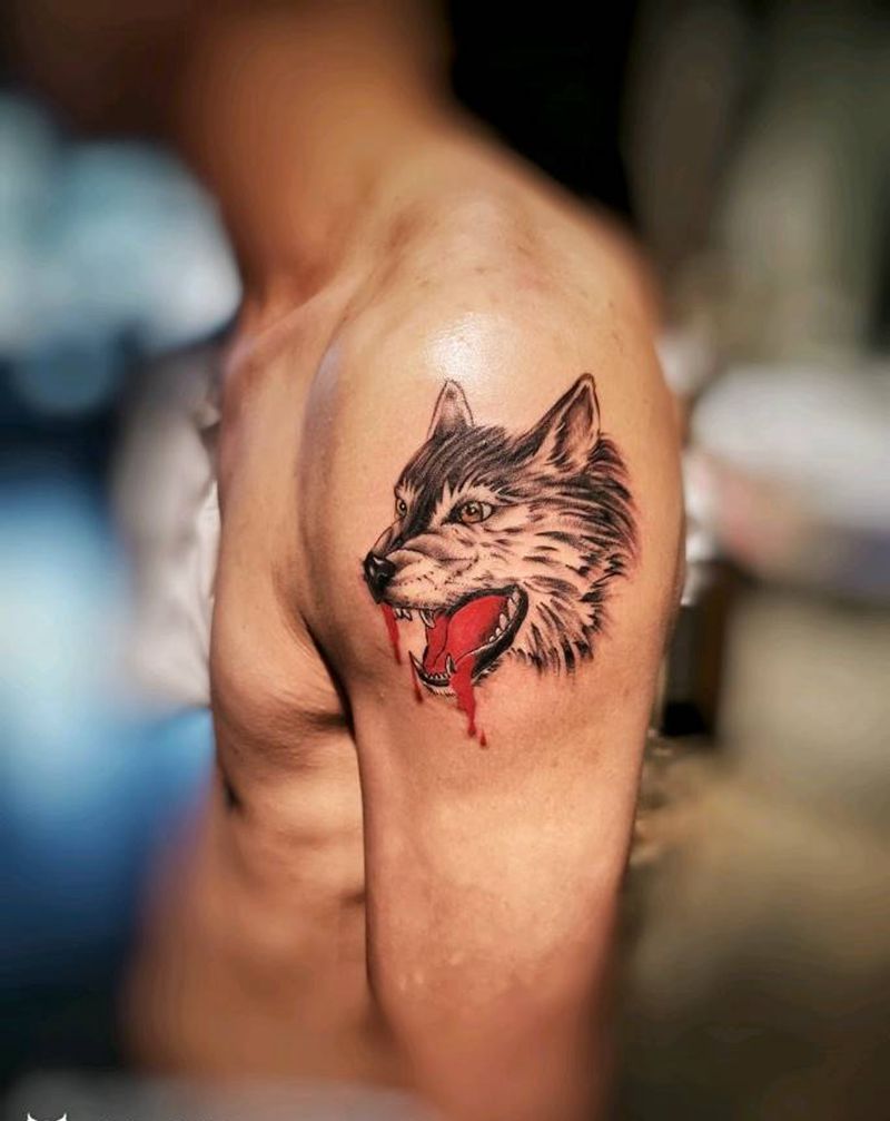 滴血狼头纹身图片_手臂纹身图案