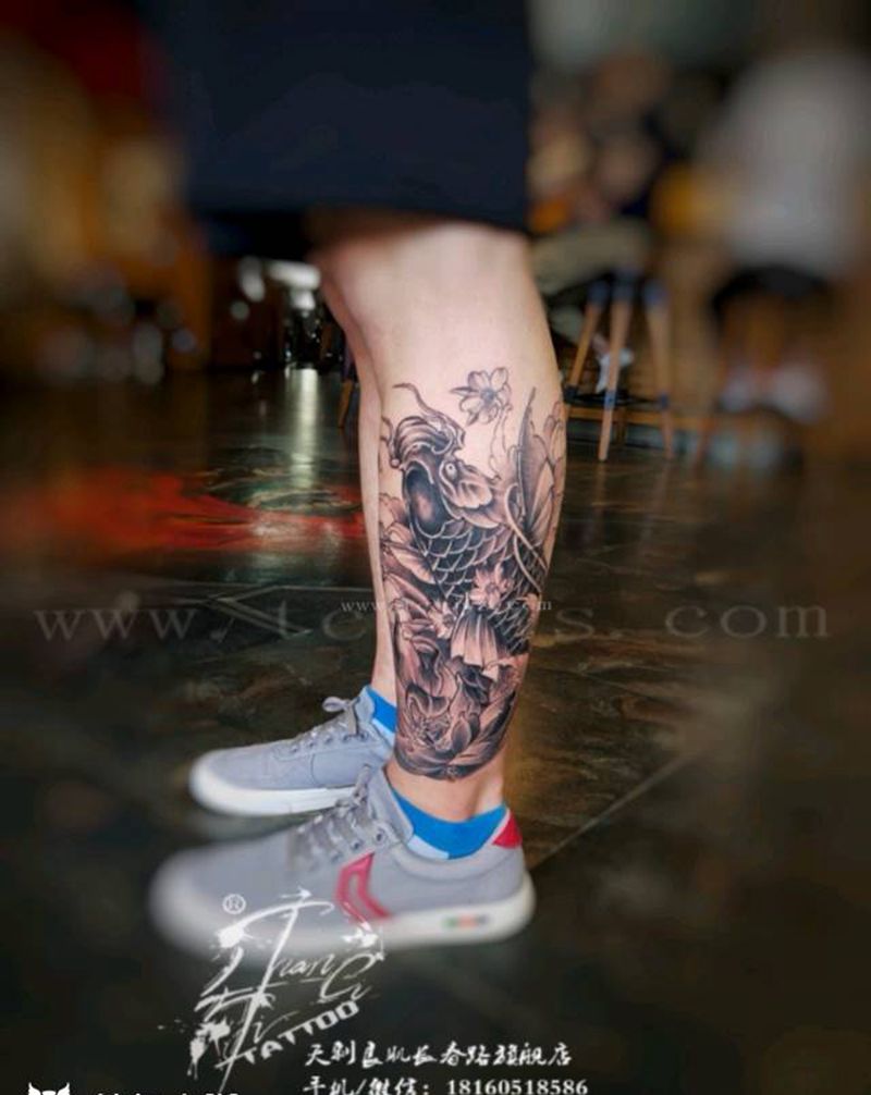 小腿鱼纹身图片_腿部新传统纹身图案