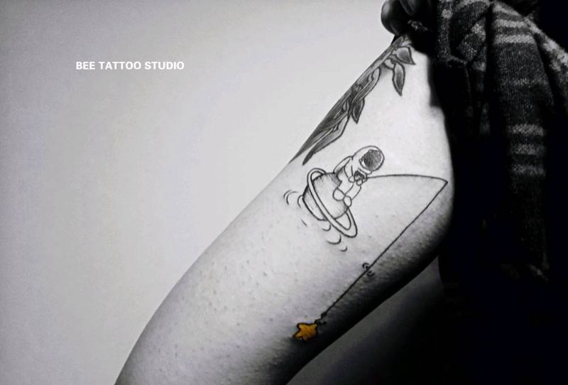 小小宇航員纹身图片