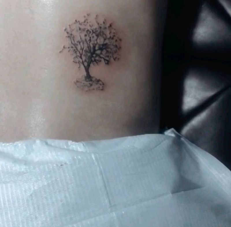 气已去 神不倒纹身图片_腰部纹身图案