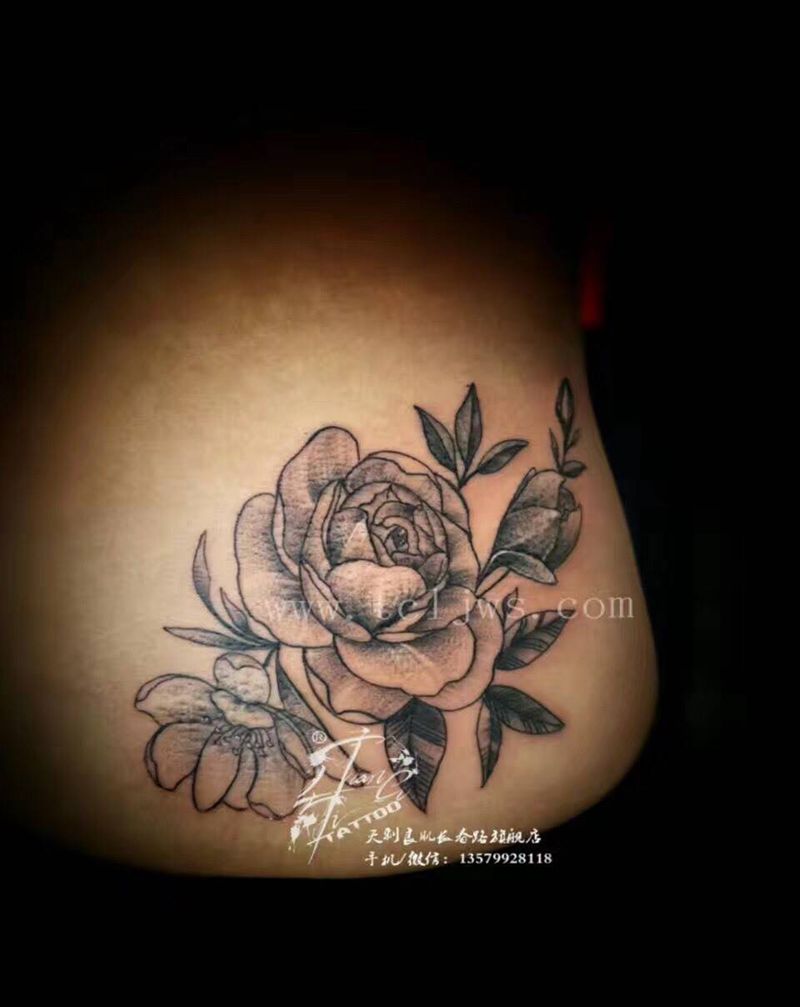 点刺小花纹身图片_成品植物腰部纹身图案