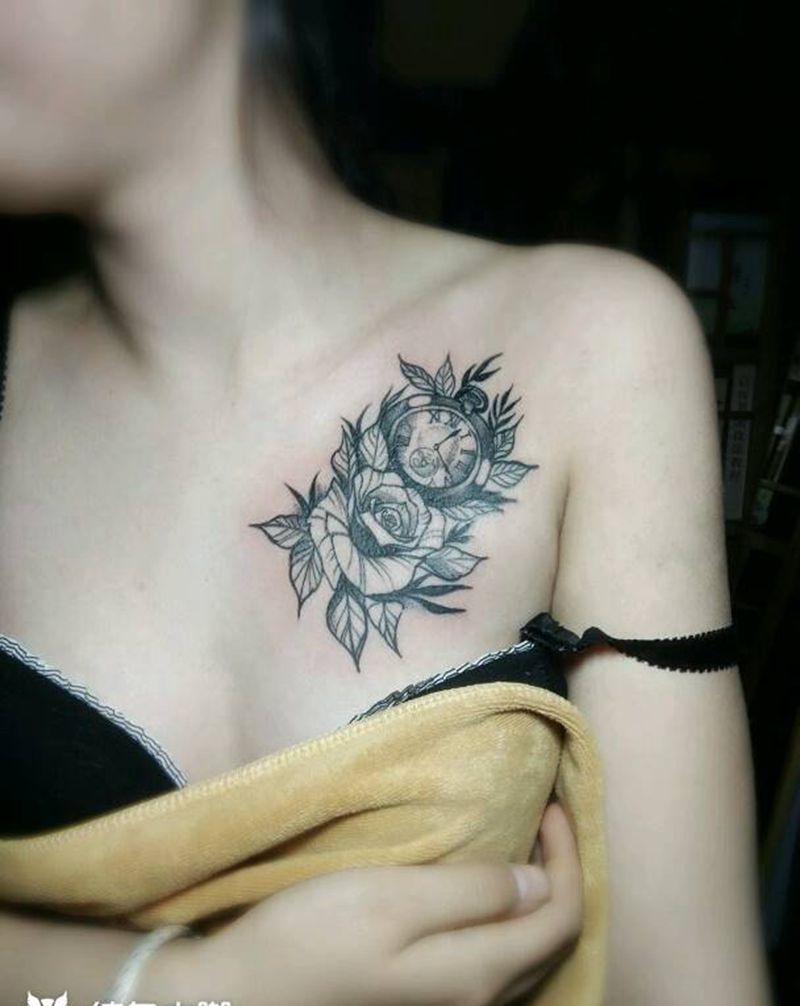 时钟和花纹身图片