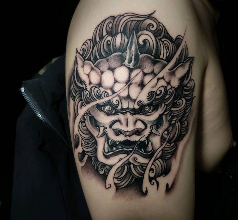 谛听纹身图片_手臂新传统纹身图案