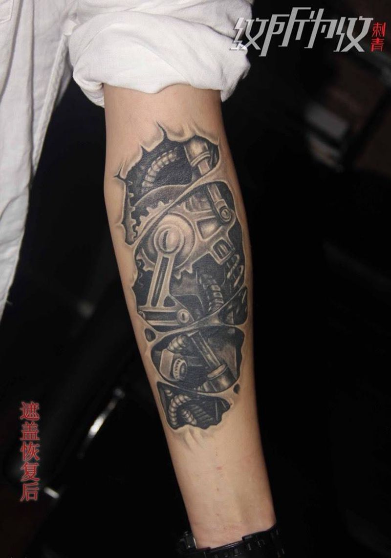 恢复后的机械遮盖纹身图片