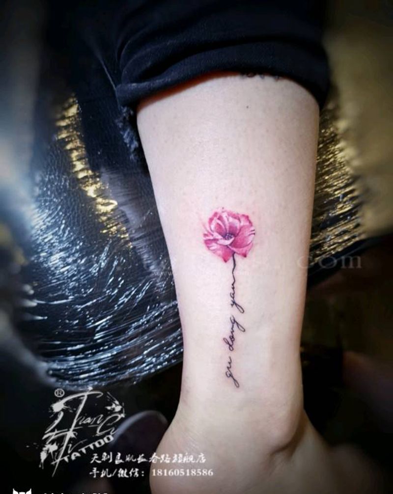 脚踝小花花纹身图片_腿部纹身图案